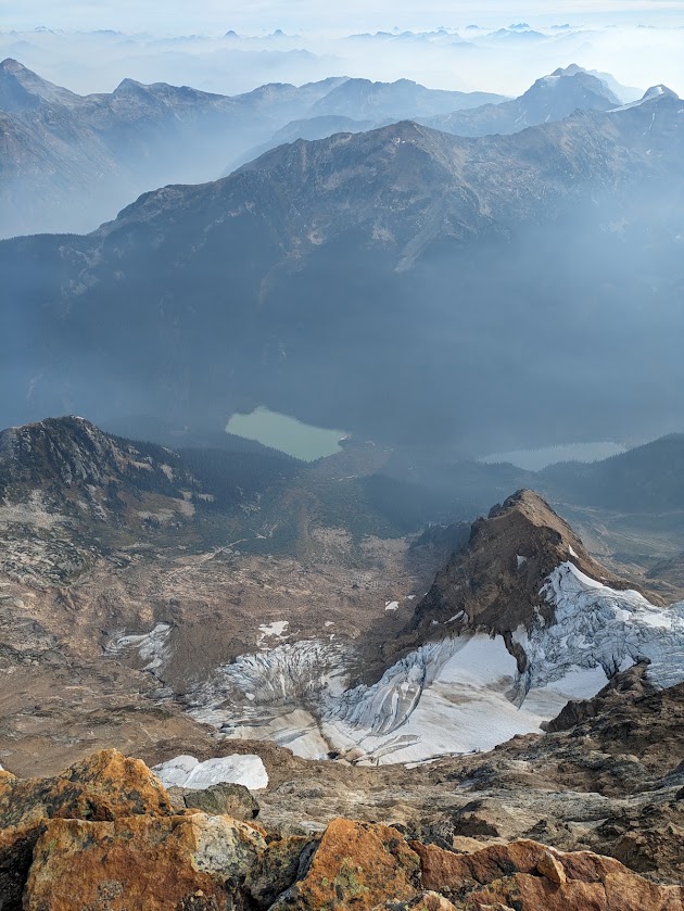 Looking down from the summit over glaciers and an avalanche path