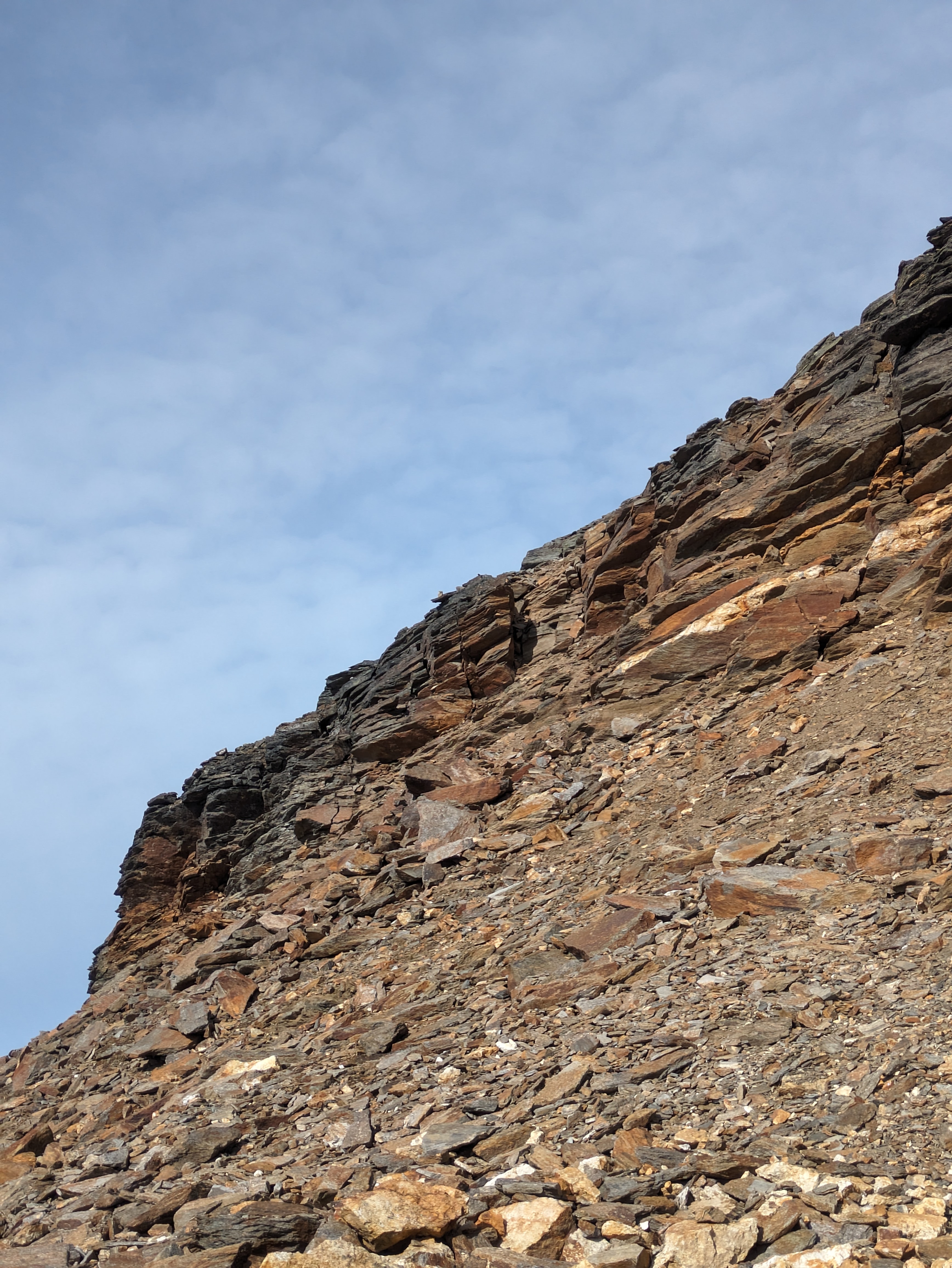 Climbing the loose gully past the second crux